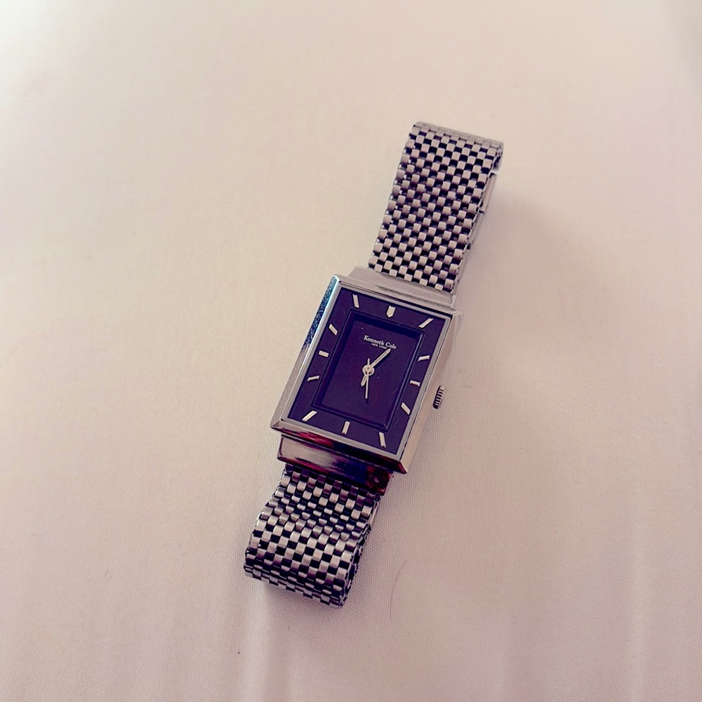 Vintage Kenneth Cole stainless steel women’s watch, mesh with black dial